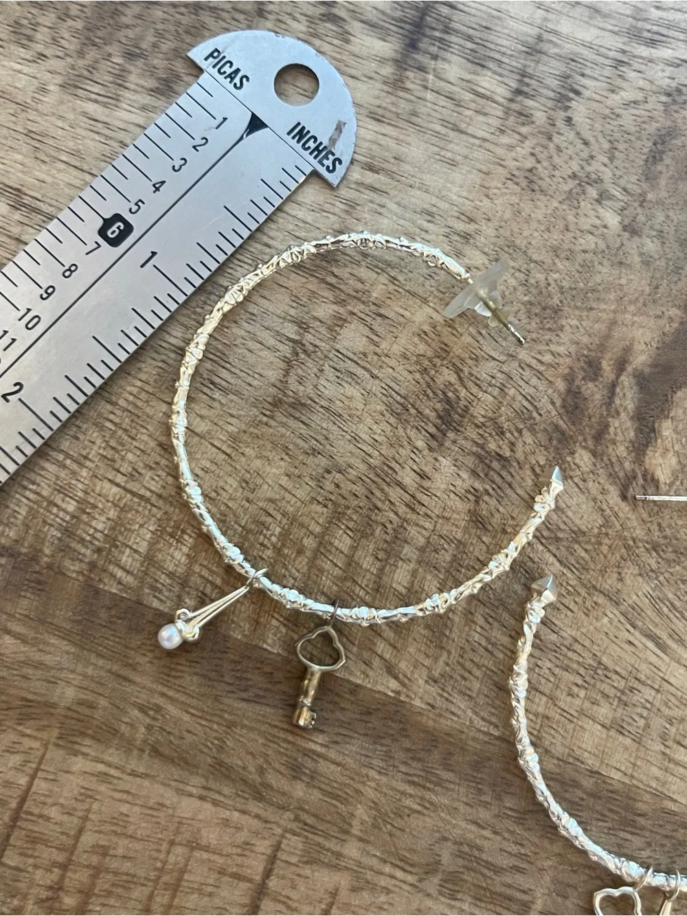 Kendra Scott gold hoops with charms